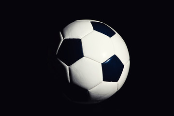 soccer ball isolated on black background.