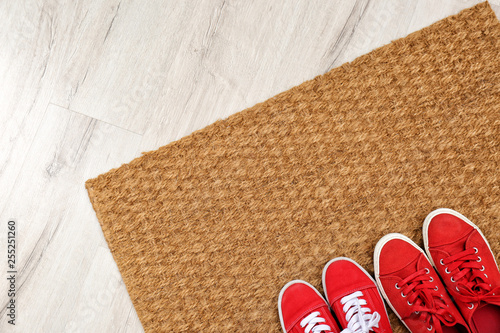 New Clean Doormat With Shoes On Floor Top View Space For