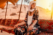 Travel woman in beduin village in the desert