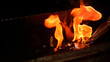 MACRO, DOF: Beautiful fire on a glowing blade getting quenched in hot oil.