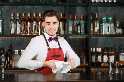 Download Portrait Of Smiling Handsome Young Bartender Dressed In Uniform Free HD Get Wallpaper Portrait Of Smiling Handsome Young Bartender Dressed In Uniform For Free