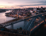 Fototapeta Most - famous view of Porto at sunset, near the tagus river, in Portugal