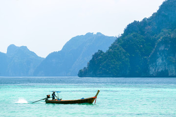 Wall Mural - Beautiful landscape with traditional boat on the sea in Phi Phi region, Thailand. Travel, holiday in the Asia.