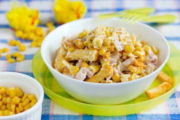 Wall Mural - Mixed salad from ham, cheese, boiled egg,  canned corn and bread crusts with mayonnaise dressing for Easter dinner