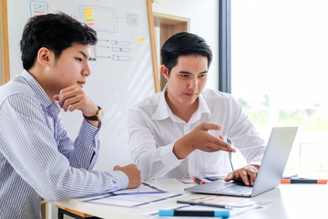Wall Mural - young man designers planning work together on website ux app development.