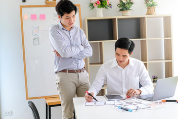 Wall Mural - young man designers planning work together on website ux app development.