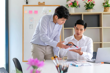 Wall Mural - young man designers planning work together on website ux app development.