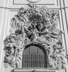 Wall Mural - PRAGUE, CZECH REPUBLIC - OCTOBER 18, 2018: Baroque relief of apostle St. Francis of Assisi over the side entry  of  Bazilika Svatého Jakuba Většího (James the Greater) by Ottavio Mosto (1695 -1701).