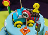 Fototapeta Młodzieżowe - Kids cake decorated with Construction machinery