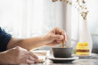 © pairhandmade - People serve beautiful fresh relax morning coffee cup set - people with coffee set background concept