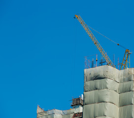 Building crane and buildings under construction