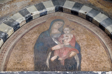 Virgin Mary with baby Jesus, fresco in the Santa Maria Novella Principal Dominican church in Florence, Italy