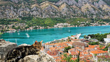 Fototapeta  - A guardian of the Kotorski Bay, Montenegro. This is one of the beautiful bays in Europe.