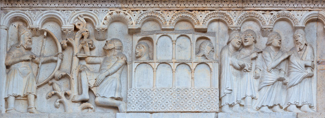 Wall Mural - MODENA, ITALY - APRIL 14, 2018: The romanesque relief of Kain and Abel from paradise on the facade of Duomo di Modena.