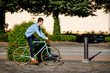 © Jacek Chabraszewski - Young man biking in city park