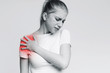 © Prostock-studio - Young woman suffering from pain in shoulder