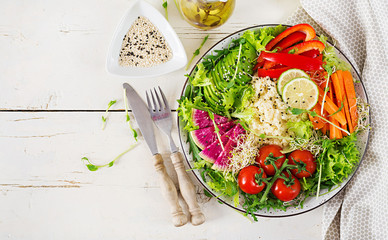 Couscous and vegetables bowl.  Trend food. Healthy, diet, vegetarian food concept on a light background . Vegan buddha bowl. Top view