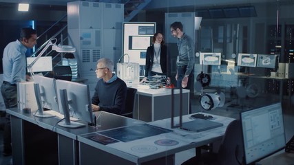 Fototapete - Diverse International Team of Industrial Engineers and Scientists Working in Research Laboratory and Development Center. People Working with 3D Printing, Using CAD on Computers, Designing Engine 