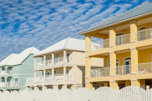 Brand New Oceanfront Multicolored Vacation Homes On The White Sandy Beach Of Gulf Of Mexico, Alabama, USA