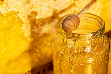 Wall Mural - Honey in glass jar