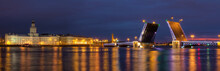 Night Panoramic View On Illumunated Open Palace Bridge, Neva River And Buildings On The Embankment, St. Petersburg, Russia