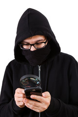 Wall Mural - Hacker with a Magnifying Glass