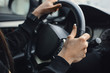 © Катя Датунова - Women's hands on the wheel of a car while driving
