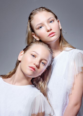 Sticker - portrait of little model girl in studio