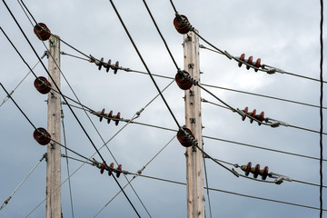 Abandon coal burning industrial power plant with wires and insulators 