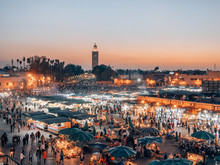 Djemaa El Fna - A Famous Market Place In Marrakech, Morocco While Sunset