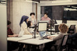 © .shock - multiethnics team of software developers working together