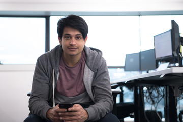 software developer using mobile phone