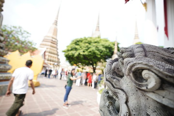 Wall Mural - wat Pho as a famous landmark in Bangkok, Thailand