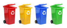 Yellow, Green, Blue And Red Recycle Bins With Recycle Symbol Isolated On White Background