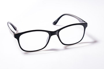 Black eye glasses spectacles with shiny black frame For reading daily life To a person with visual impairment isolaged on white background.