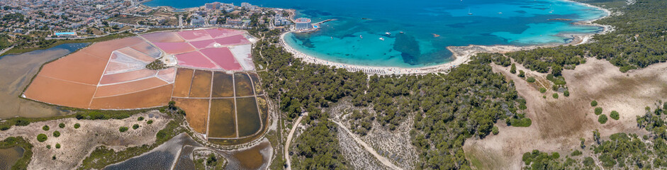 Colonia Sant Jordi, Mallorca Spain. Amazing drone aerial landscape of the pink salt flats and the charming beach Estanys