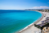 Fototapeta Do akwarium - Nice, beautiful beach, French Riviera, Cote d'Azur or Coast of Azure. Bright turquoise water. 