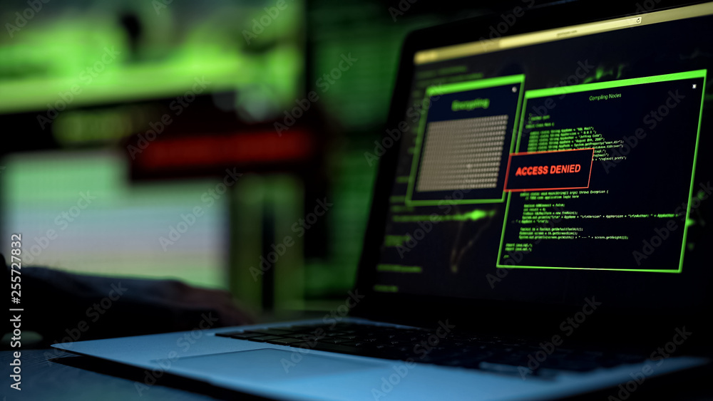 Message Access denied written on laptop screen, server blocking hacking ...