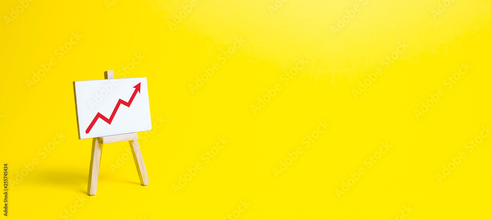 Rack with a red arrow up on a yellow background. Business planning and revenue analysis. Indicators of business projects, level of profitability, liquidity. Increase efficiency, productivity. banner - obrazy, fototapety, plakaty 