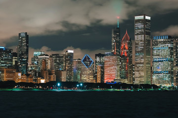 Wall Mural - Downtown Chicago cityscape skyline at night with Lake Michigan in the foreground