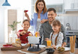 © New Africa - Happy family enjoying fondue dinner at home