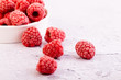 Frozen Raspberries on white
