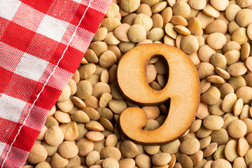 Number 9, Lentils with checkered napkin - Top view