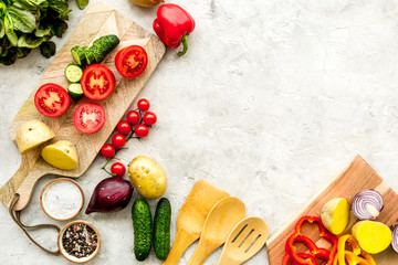 Wall Mural - Fresh food ingredients for vegetarian kitchen on white stone background top view mock-up