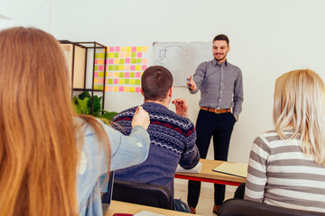 Wall Mural - Teacher explaining a lecture