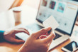 © joyfotoliakid - Online banking businessman using Laptop with credit card Shopping online Fintech and Blockchain concept