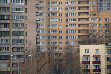 windows of apartment buildings in a residential area of the city, where every tenant has his own pri