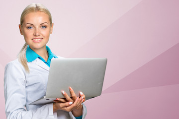 Wall Mural - Woman doctor with laptop