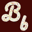 Tempting tipography. Font design. 3D letter B of the whipped cream and candy