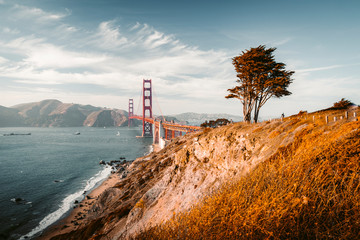 Fototapete - Golden Gate Bridge at sunset, San Francisco, California, USA